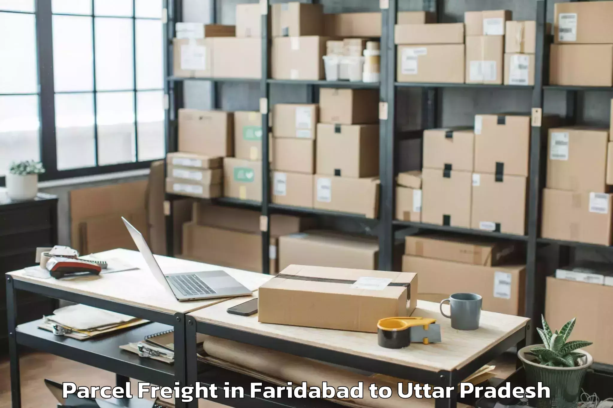 Faridabad to Gahmar Parcel Freight Booking